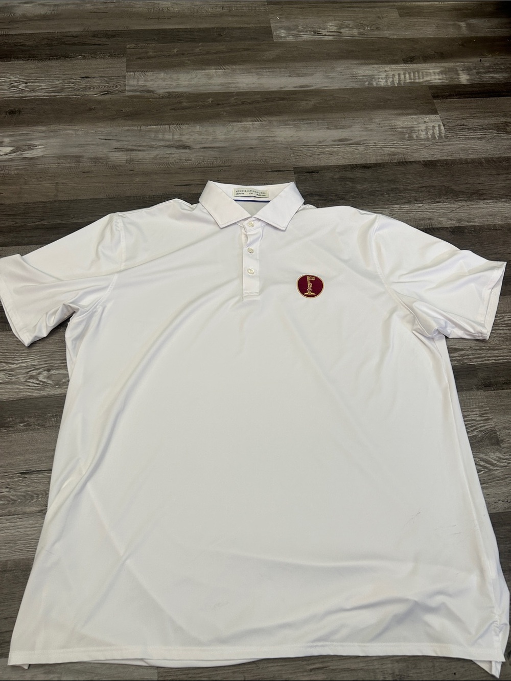 White Performance Polo with Red Crest Embroidery